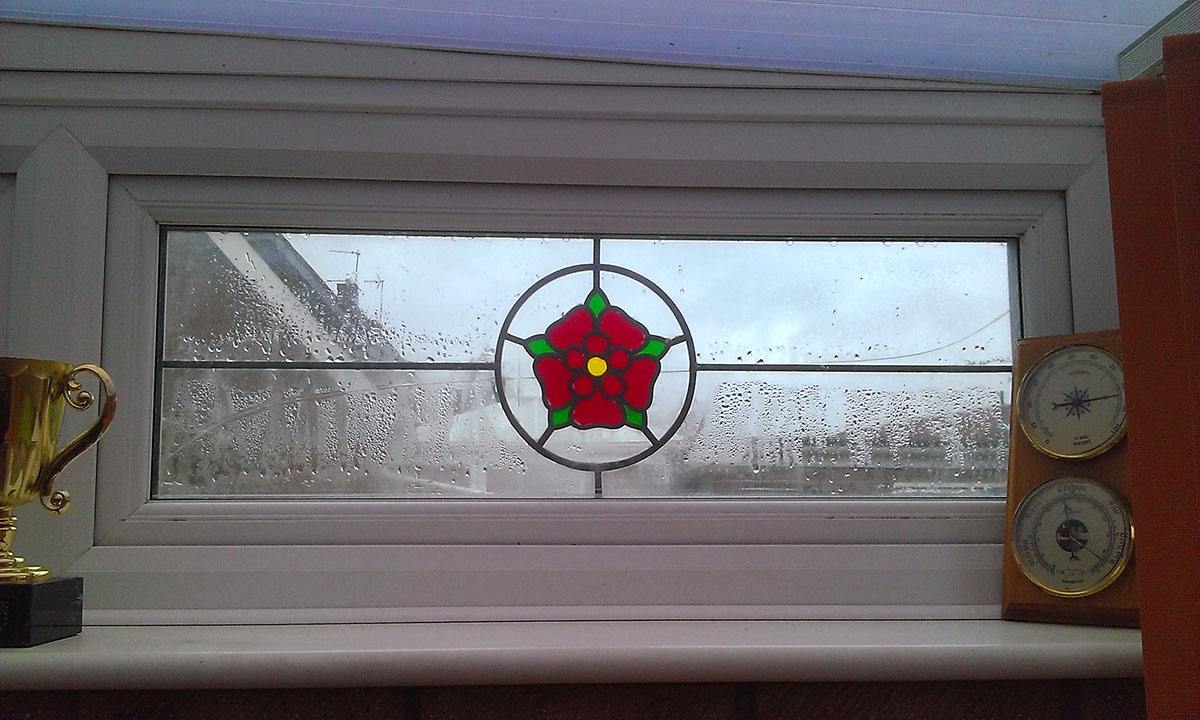 S&C Window repairs stained glass windows in Norfolk